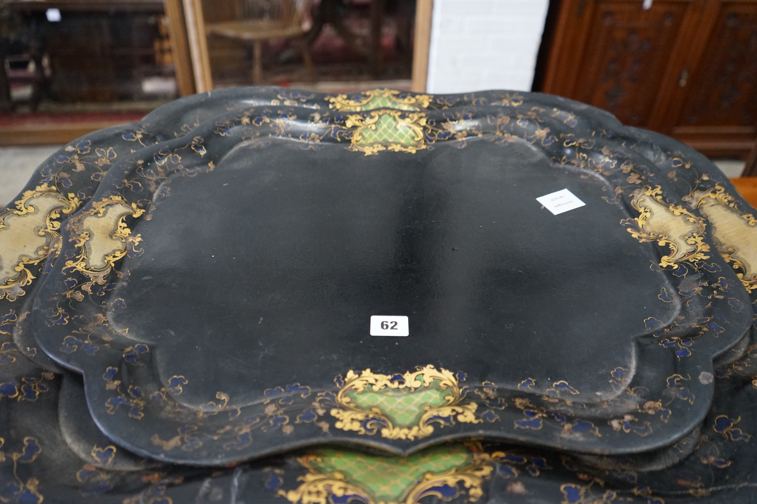 A graduated pair of Victorian papier mache trays, width 78cm, depth 60cm, height 50cm together with a later stand